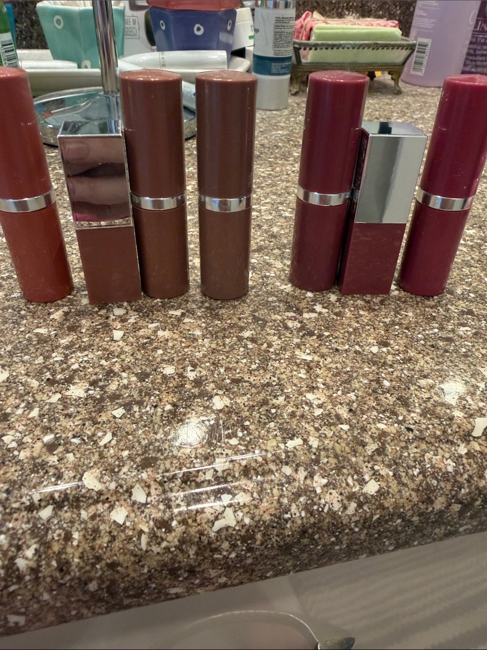 Clinique Lipstick Collection in Brown, Rose, Plum, and Mauve Tones